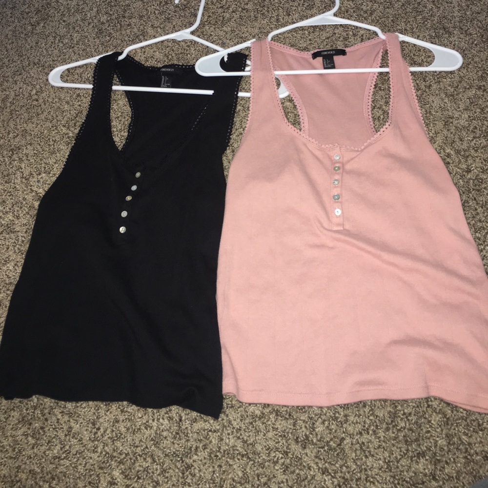 Pink and black tank tops with buttons